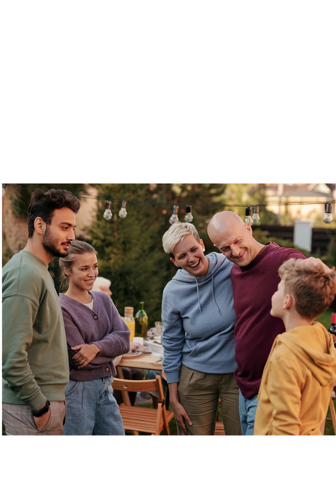 picture of a happy family gathered outside